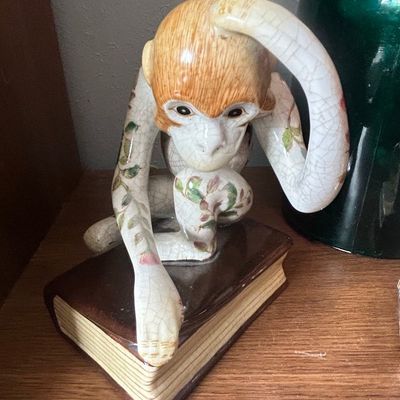 Sale Photo Thumbnail #765: Ceramic Monkey Figurine on Book