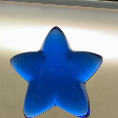 Sale Photo Thumbnail #747: Kosta Boda Cobalt Blue Star Paperweight