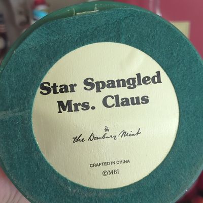 Sale Photo Thumbnail #327: Danbury Mint Star Spangled Mrs. Claus and Santa Claus Figurines