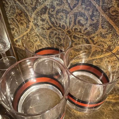Sale Photo Thumbnail #862: Mid-Century Modern Lowball Glasses with Orange and Black Bands