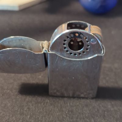Sale Photo Thumbnail #242: Vietnam War Era Trench Lighter