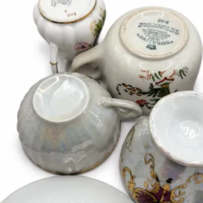 Floral Cups, Creamers And Saucers