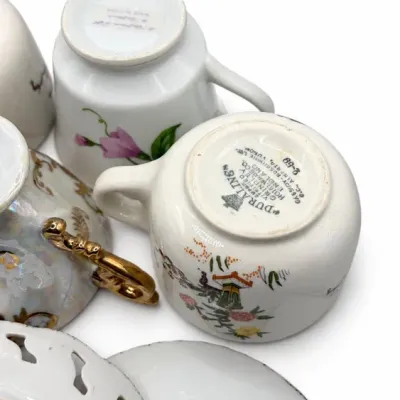 Floral Cups, Creamers And Saucers