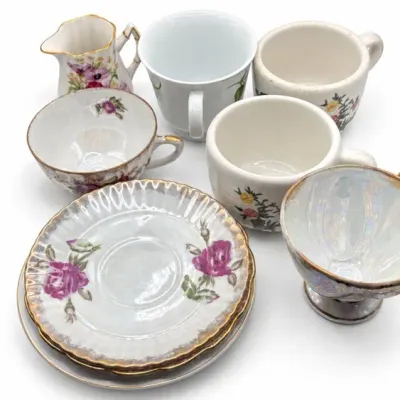 Floral Cups, Creamers And Saucers