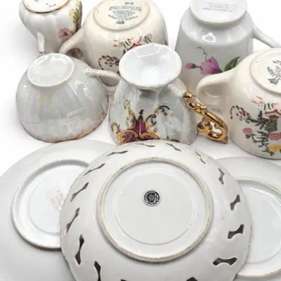 Floral Cups, Creamers And Saucers