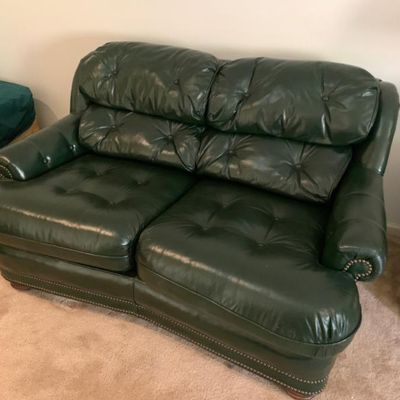 Very nice Hunter green leather tufted loveseat in excel. cond.