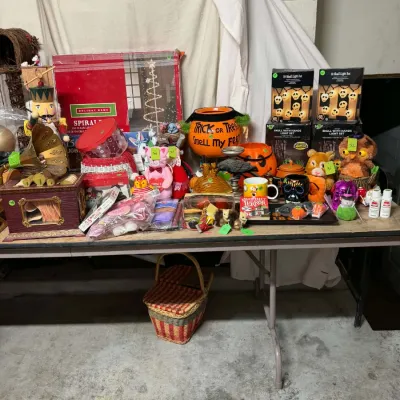 Sale Photo Thumbnail #37: Vintage Halloween, Christmas, and Valentine's Day decorations, including skull light sets, nutcrackers, candy buckets, plush figures, and novelty items.