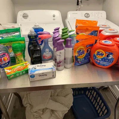Sale Photo Thumbnail #27: Large assortment of household cleaning supplies and laundry detergents, including Tide Pods, Gain, Febreze, and Downy! 