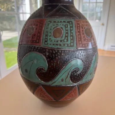 Sale Photo Thumbnail #38: Hand-painted pottery vase featuring geometric and wave motifs in earth tones and turquoise glaze.