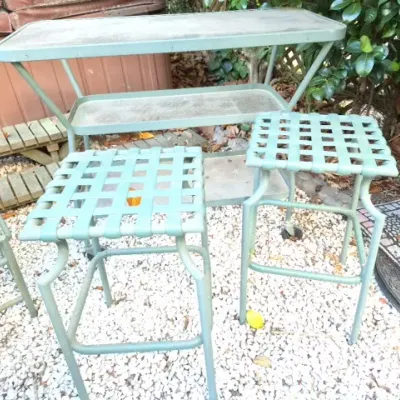 Sale Photo Thumbnail #170: Vintage green metal outdoor patio set including a two-tier rolling cart or console table with a pair of matching woven-top barstools.