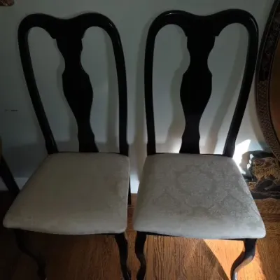 Sale Photo Thumbnail #53: Pair of Queen Anne style side chairs featuring dark-stained wood frames with vase-shaped splats and damask pattern upholstered seats.