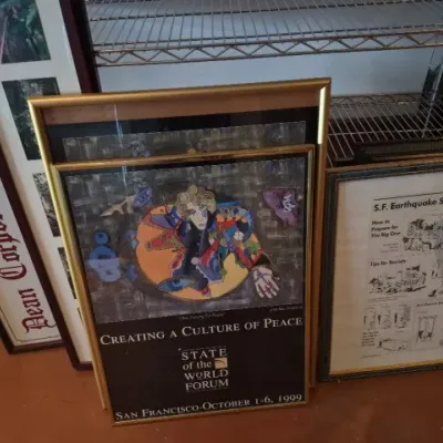 Sale Photo Thumbnail #179: Selection of framed art prints and posters, including a 1999 State of the World Forum "Creating a Culture of Peace" poster and an S.F. Earthquake Survival Guide print.