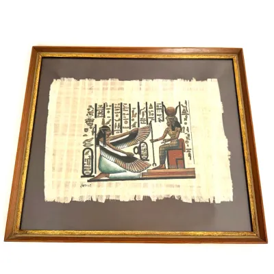 Framed Egyptian papyrus painting featuring classical imagery of deities and hieroglyphics, housed in a wooden frame with gilt interior trim.