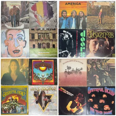 Collection of classic rock vinyl LP records, including albums by Bob Dylan, The Doors, The Grateful Dead, America, and Alice Cooper,...