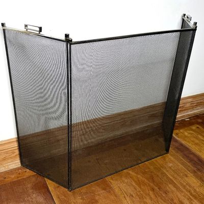 Three-panel black mesh folding fireplace screen featuring a simple metal frame with top side handles.
