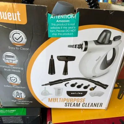 Sale Photo Thumbnail #12: Phueut branded handheld multipurpose steam cleaner in its original retail packaging with various cleaning attachments.