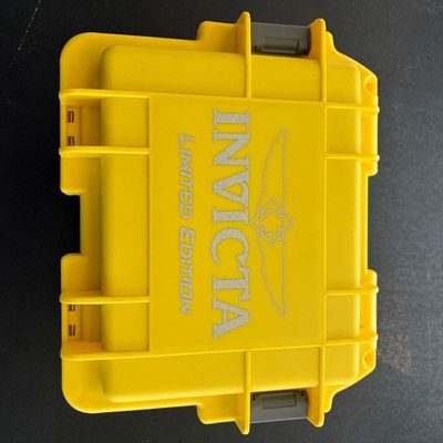 Bright yellow Invicta Limited Edition hard-shell impact-resistant watch collector box featuring secure latches.