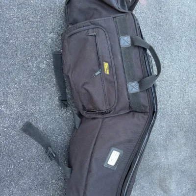 Sale Photo Thumbnail #10: Black Bag Boy padded golf travel bag with multiple zippered pockets and carrying handles.