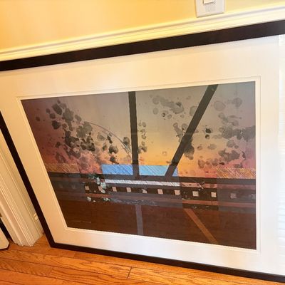 Sale Photo Thumbnail #140: Large framed abstract artwork featuring geometric shapes and splatter details in a dark wood frame with white matting.