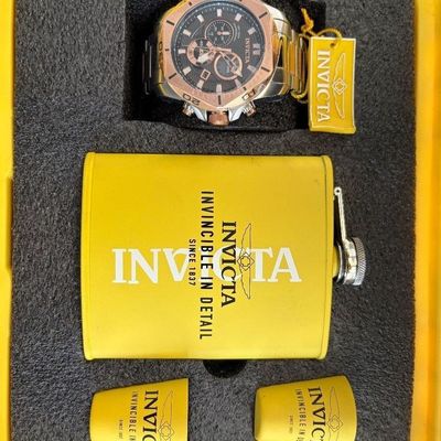 Invicta chronograph wristwatch gift set featuring a rose gold-tone and stainless steel case, paired with a matching yellow flask and shot...