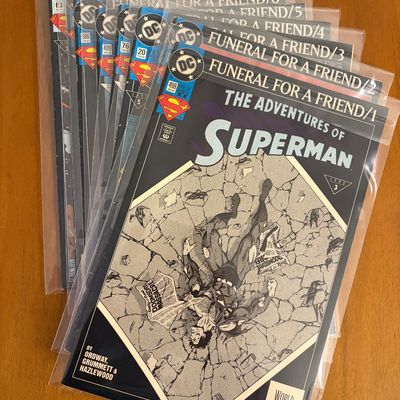 Set of eight DC Superman comic books featuring the Funeral for a Friend storyline from 1993, individually bagged in plastic sleeves.