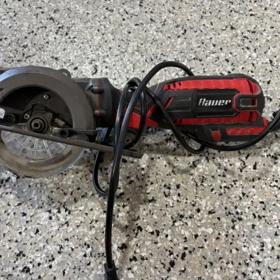 Sale Photo Thumbnail #65: Bauer corded compact circular saw, showing moderate use with power cord wrapped around the handle.