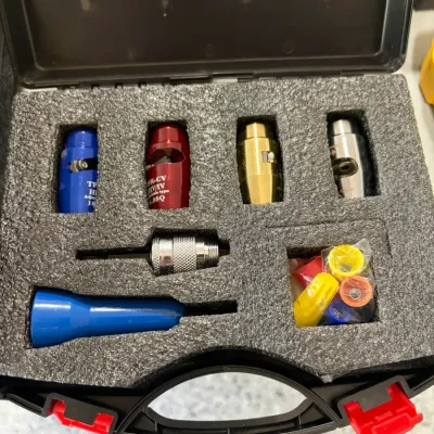 Sale Photo Thumbnail #37: Wire stripper and cable preparation tool kit arranged in a custom foam-lined hard carrying case.