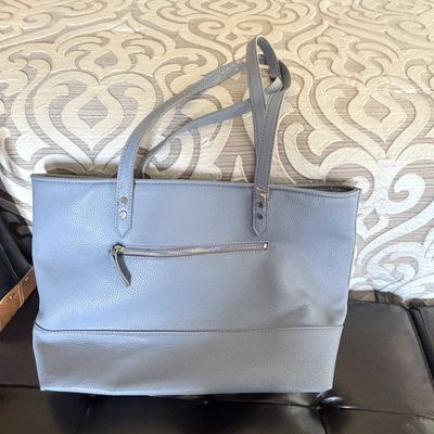Sale Photo Thumbnail #304: Perlina light gray textured leather tote bag featuring double shoulder straps and a front zippered pocket.