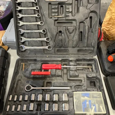 Sale Photo Thumbnail #39: Incomplete hand tool and socket set housed in a black molded plastic carrying case.