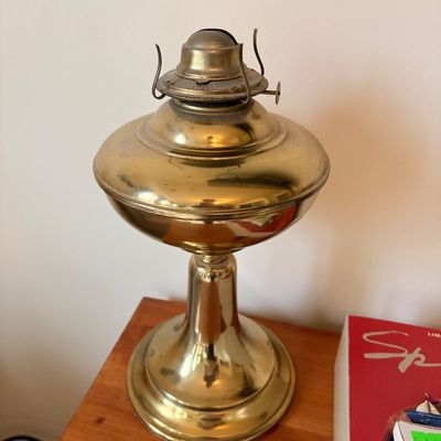 Sale Photo Thumbnail #266: Vintage brass oil lamp base with burner assembly, missing its glass shade and chimney.