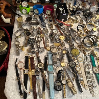Sale Photo Thumbnail #24: Large collection of vintage and modern men's and women's wristwatches, including digital calculator watches, dress watches, and fashion timepieces.