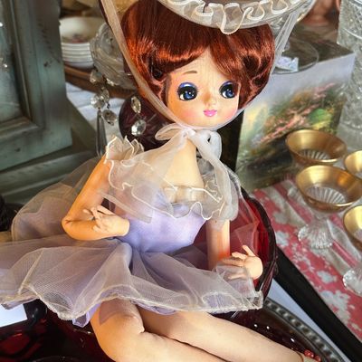 Sale Photo Thumbnail #31: Vintage Bradley-style pose doll in a lavender tulle dress and ruffled bonnet, featuring big painted eyes and long cloth legs.