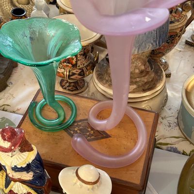 Sale Photo Thumbnail #43: Pair of vintage blown glass trumpet vases with coiled bases, one in frosted pink satin glass and the other in translucent green.