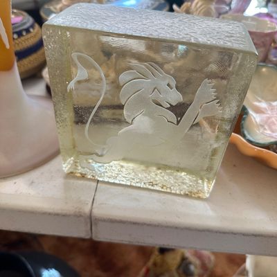 Sale Photo Thumbnail #62: Vintage Scandinavian-style glass paperweight or sculpture featuring an etched lion rampant figure.