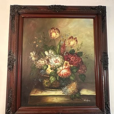 Sale Photo Thumbnail #115: Framed floral still life oil painting on canvas, signed Van Hunt, set in a heavily carved dark wood frame.