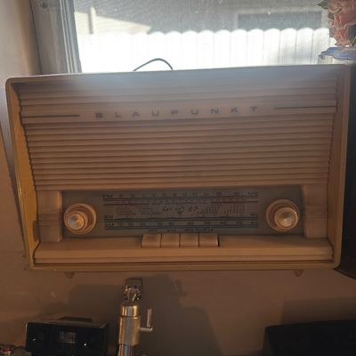 Sale Photo Thumbnail #84: Vintage Blaupunkt cream plastic tabletop radio featuring AM, FM, and shortwave bands, circa 1950s.