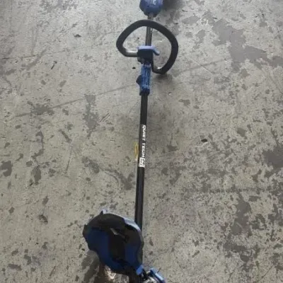 Sale Photo Thumbnail #106: Kobalt 24V Max Quiet Tech cordless string trimmer in blue and black, showing minor cosmetic wear.