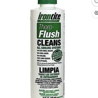 Sale Photo Thumbnail #56: Bottle of Irontite Thoro-Flush cooling system cleaner, concentrated powder formula in a 16 fl oz container.
