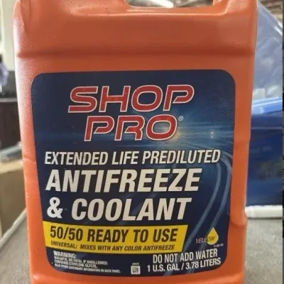 Sale Photo Thumbnail #159: One-gallon orange plastic jug of Shop Pro extended life prediluted 50/50 ready-to-use antifreeze and coolant.