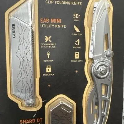 Sale Photo Thumbnail #171: New in original blister pack Gerber three-piece tool set, including a Ripstop I clip folding knife, EAB Mini utility knife, and Shard DT keychain tool.