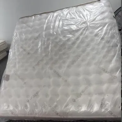 Sale Photo Thumbnail #40: Organic cotton mattress wrapped in protective plastic cover.