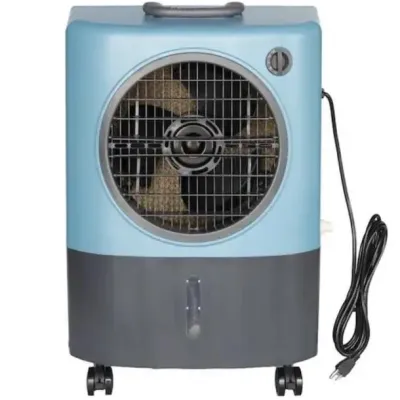 Sale Photo Thumbnail #72: Portable evaporative air cooler featuring a light blue and dark gray plastic housing, top handle, front control dial, and caster wheels.