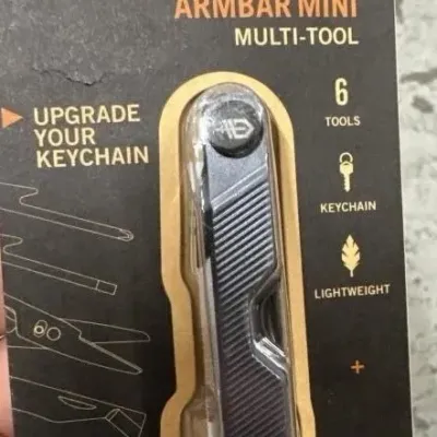 Sale Photo Thumbnail #175: Gerber Armbar Mini 6-tool keychain multi-tool, new in original blister pack packaging.