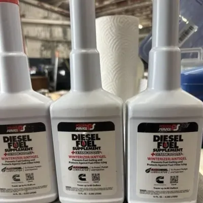 Sale Photo Thumbnail #154: Three 12 oz bottles of Power Service Diesel Fuel Supplement plus Cetane Boost winterizer and antigel treatment.