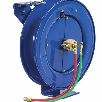 Sale Photo Thumbnail #104: Heavy-duty blue retractable dual hose reel with brass fittings, designed for oxy-acetylene welding or industrial gas lines.
