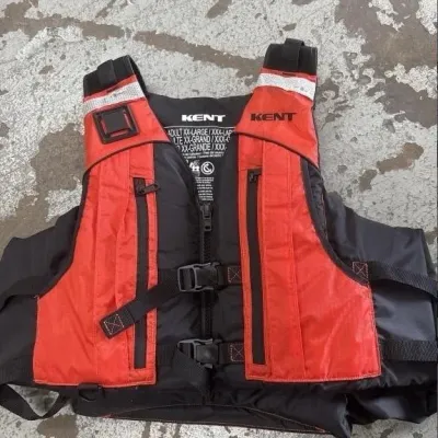 Sale Photo Thumbnail #62: Kent adult size XX-Large/XXX-Large personal flotation device in orange and black, featuring front zip closure, reflective shoulder accents, and multiple zippered pockets.