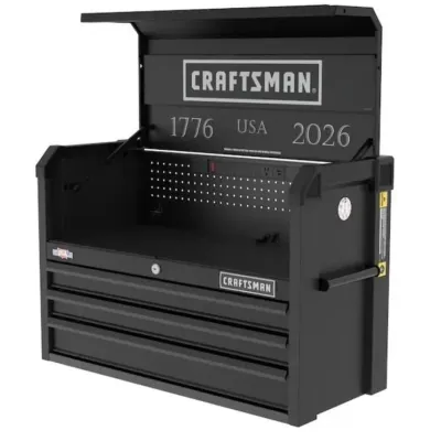 Sale Photo Thumbnail #122: Craftsman black metal tool chest featuring an open top till with a power strip, pegboard back, and three lower drawers.