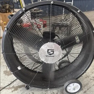 Sale Photo Thumbnail #47: Strongway large industrial rolling drum fan with heavy-duty metal safety cage and wheels.