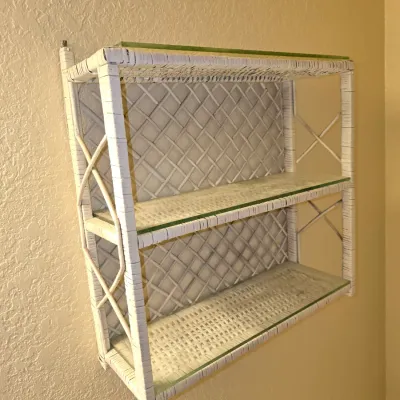 Sale Photo Thumbnail #9: Vintage white wicker three-tier wall shelf with glass inserts and crisscross backing.