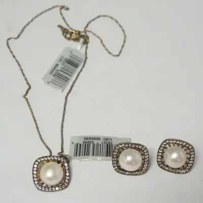 Sale Photo Thumbnail #49: 1049	LADIES EARRINGS AND NECKLACE SET WITH TOPAZ STONES MARKED 14KT GOLD  WITH TAGS, 5.3 DWT INCLUDING STONES																																																																																																																																																		